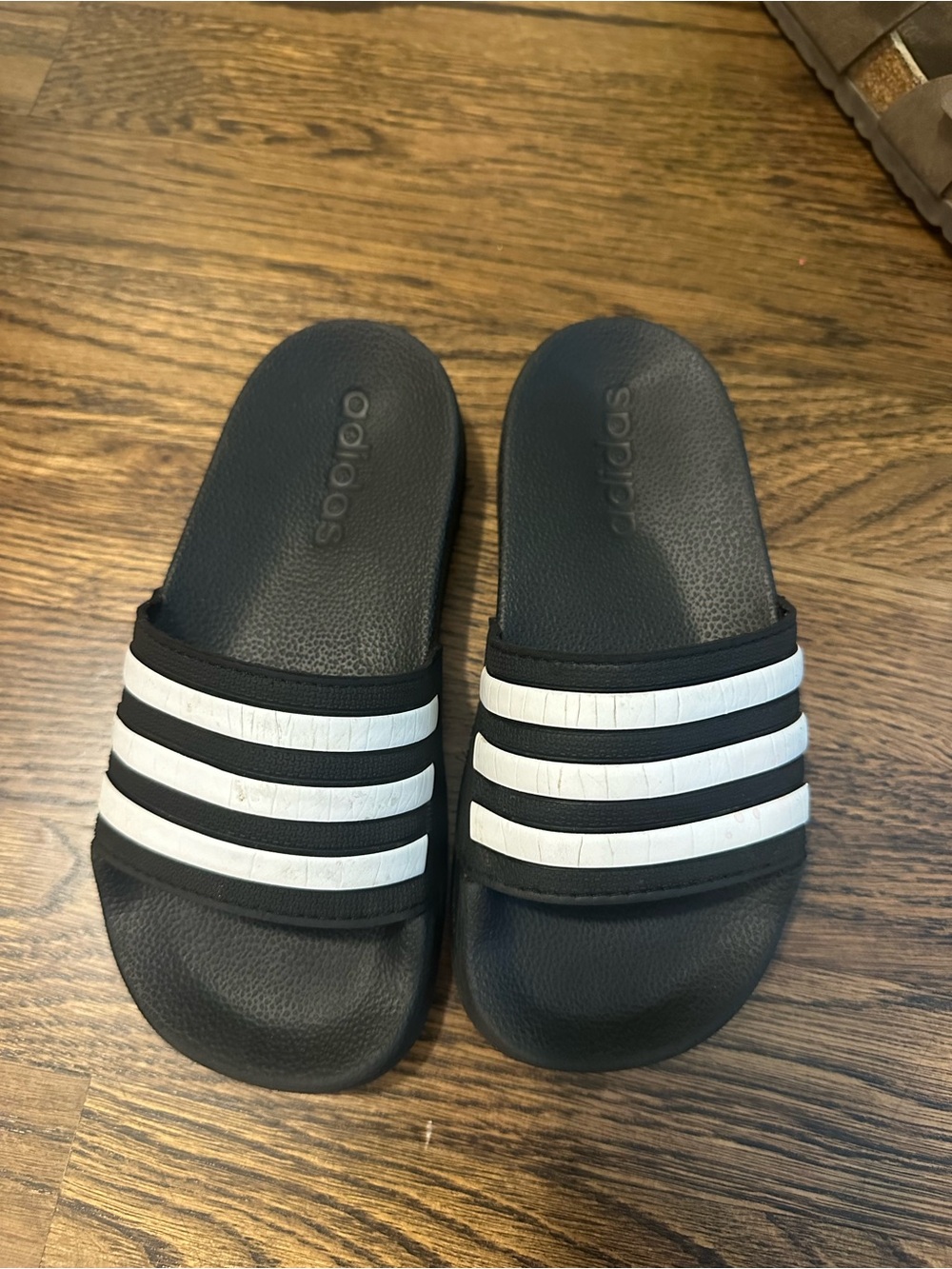 adidas Black Slides with White Three-Stripes